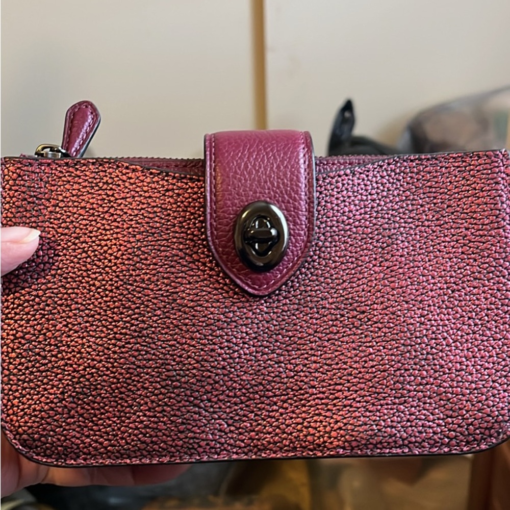Coach wristlet or Crossbody no Crossbody strap with it